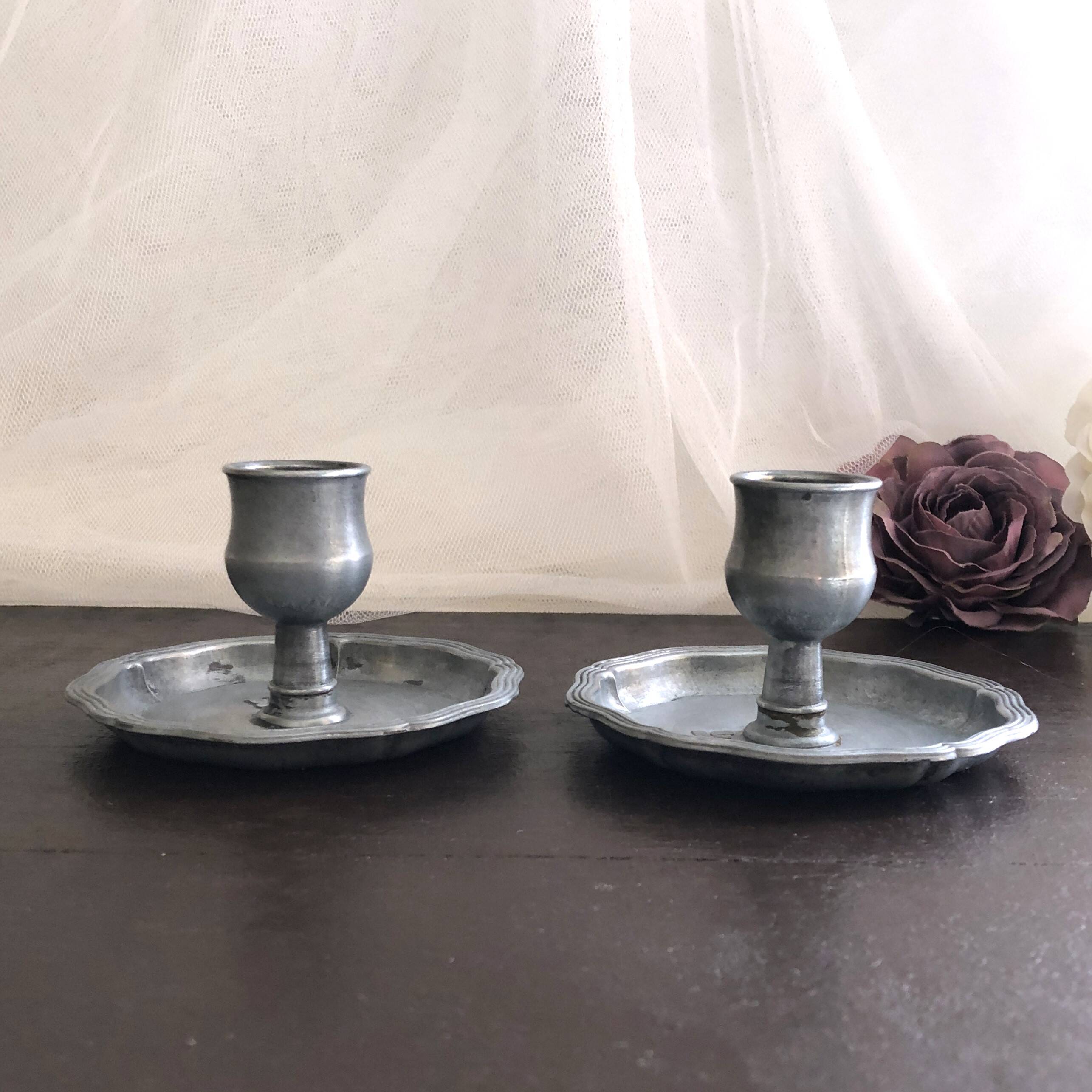 Pair of pewter table candlesticks