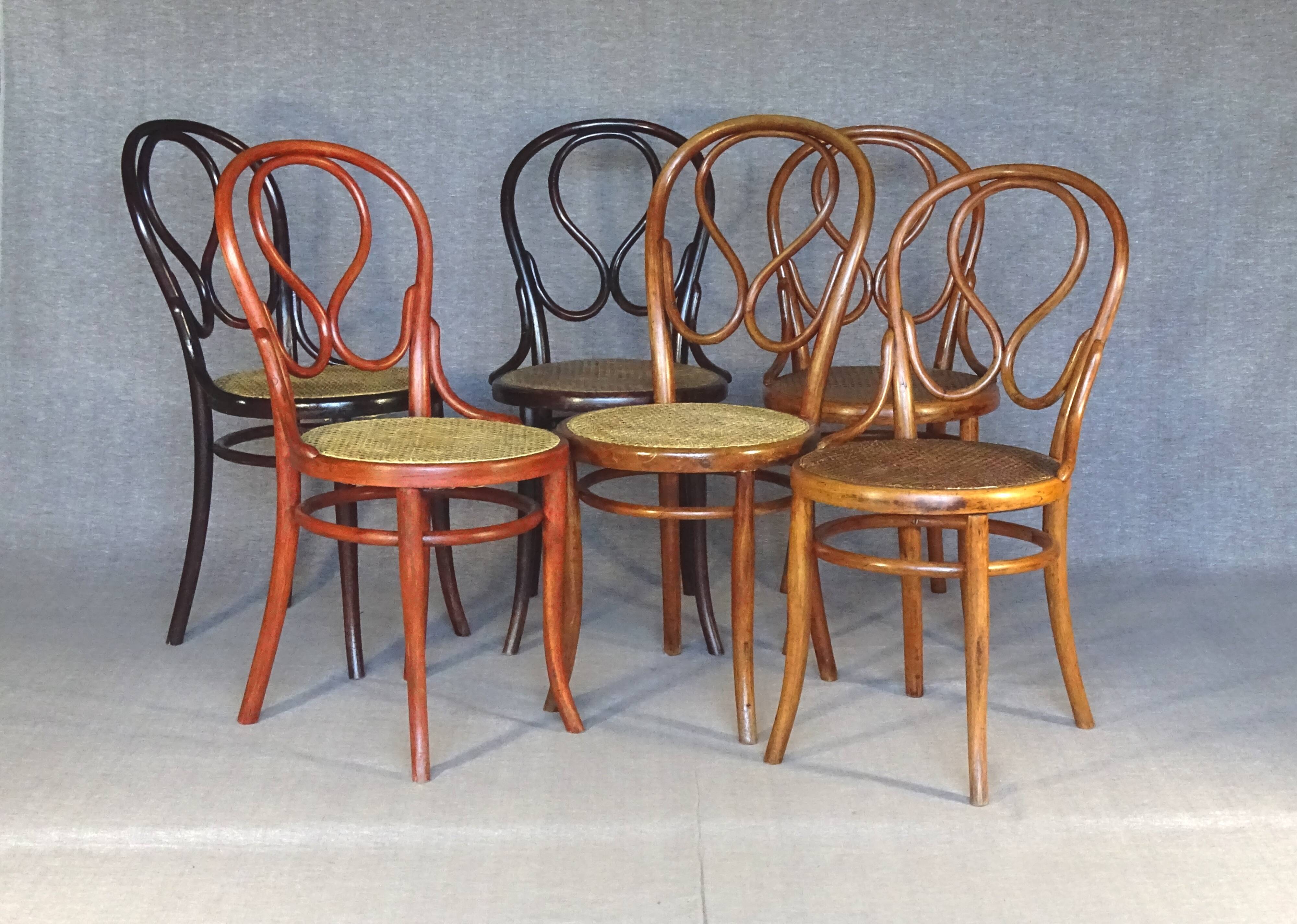 Set of 6 chairs no. 20 known as "omega" caned, including 3 thonet.