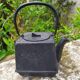 small cast iron teapot