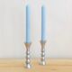Pair of vintage cast aluminum candle holders