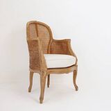 Louis XV style carved armchair with double sided cane work on the side panels