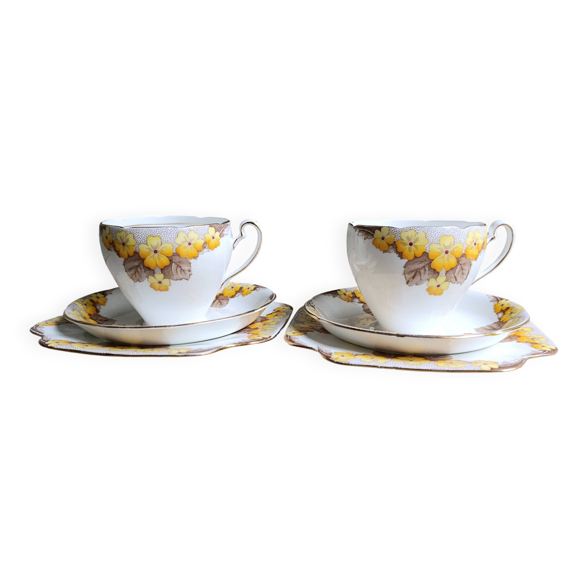 Set of two Caversham trios (cup, saucer and squared plate) , England, 1940s