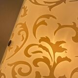 Polished and screen-printed glass sconce by eglo
