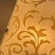 Polished and screen-printed glass sconce by eglo