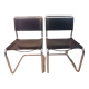 Paire de chaises en cuir noir et chrome modele Spoletto du designer Bersanelli