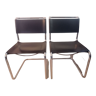 Pair of black leather and chrome chairs model Spoletto by designer Bersanelli