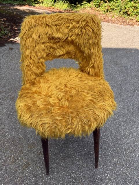Old mustard furry armchair