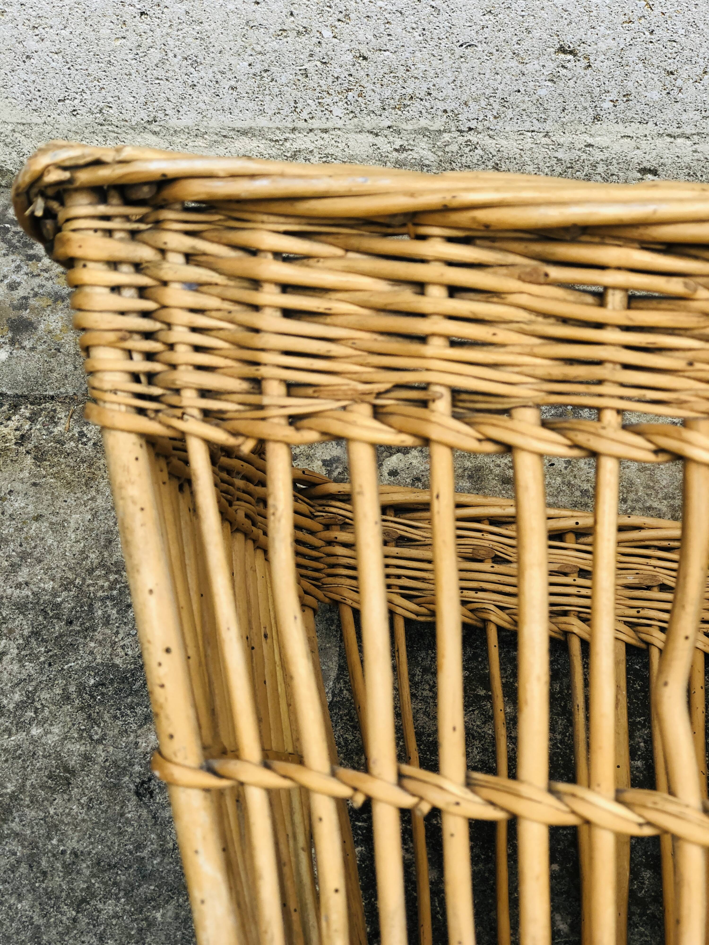 Braided wicker laundry basket