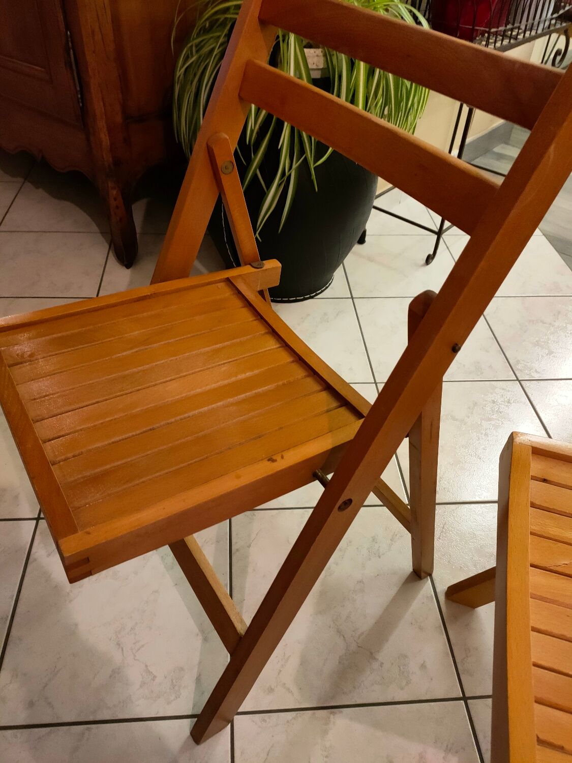 Pair of vintage folding wooden chairs