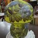 Table lamp in multilayer glass paste, adorned with a rich floral decoration.