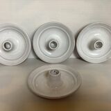 Four ceramic candle holders