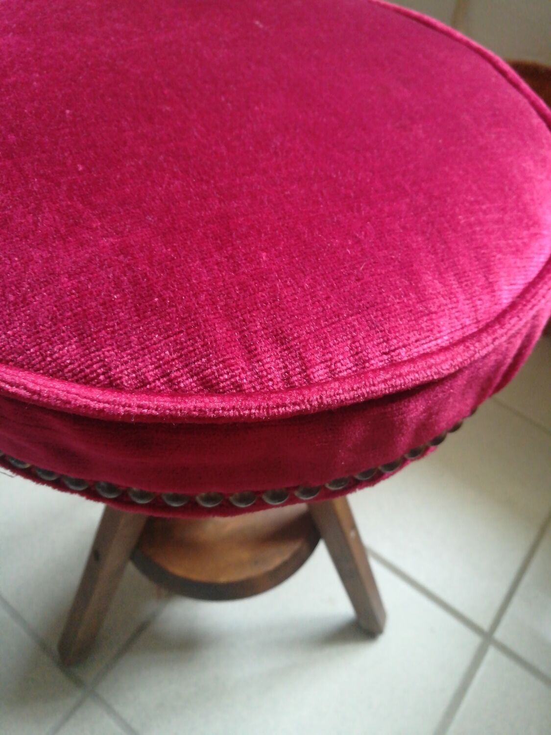 Old piano stool with screw