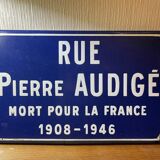 Enameled sheet metal street sign