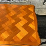 Antique extendable table in cherry wood and marquetry in the Louis XV style.
