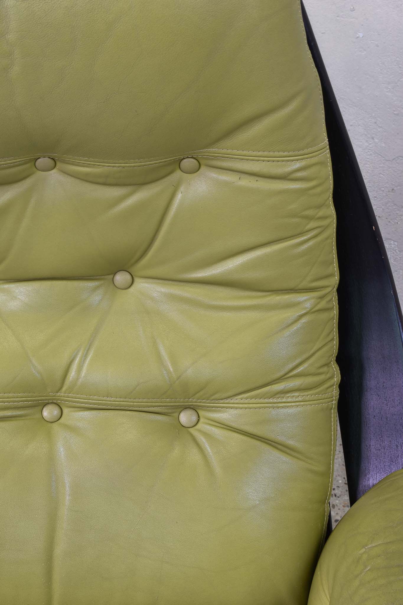 Leather swivel armchair