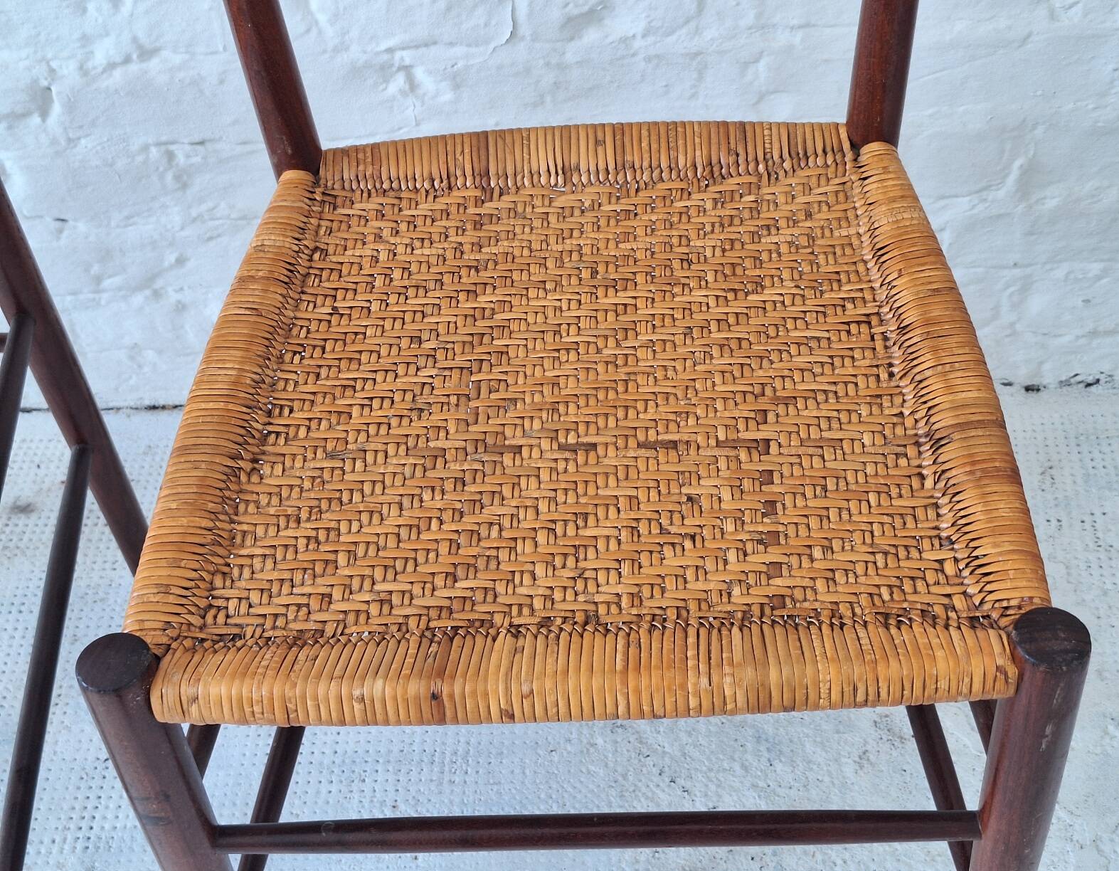 Four teak dining chairs with patinated cane after Gio Ponti, Italy 1960s