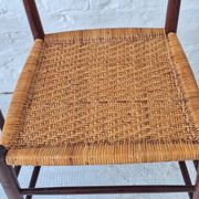 Four teak dining chairs with patinated cane after Gio Ponti, Italy 1960s