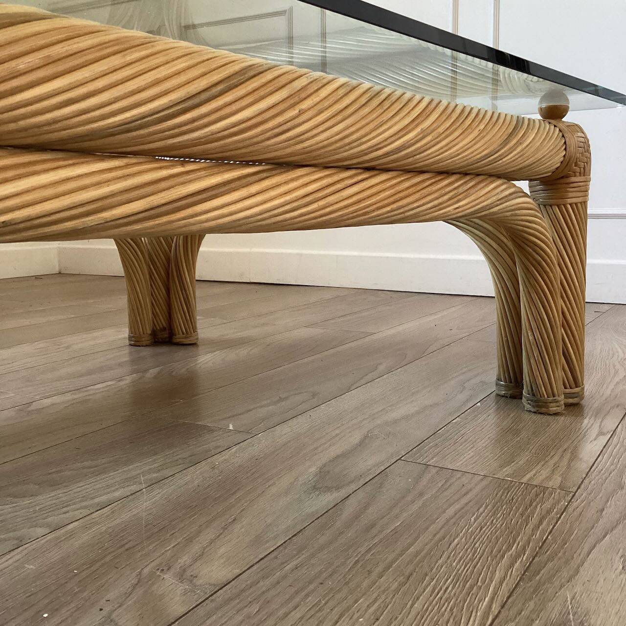 Large rattan and glass coffee table