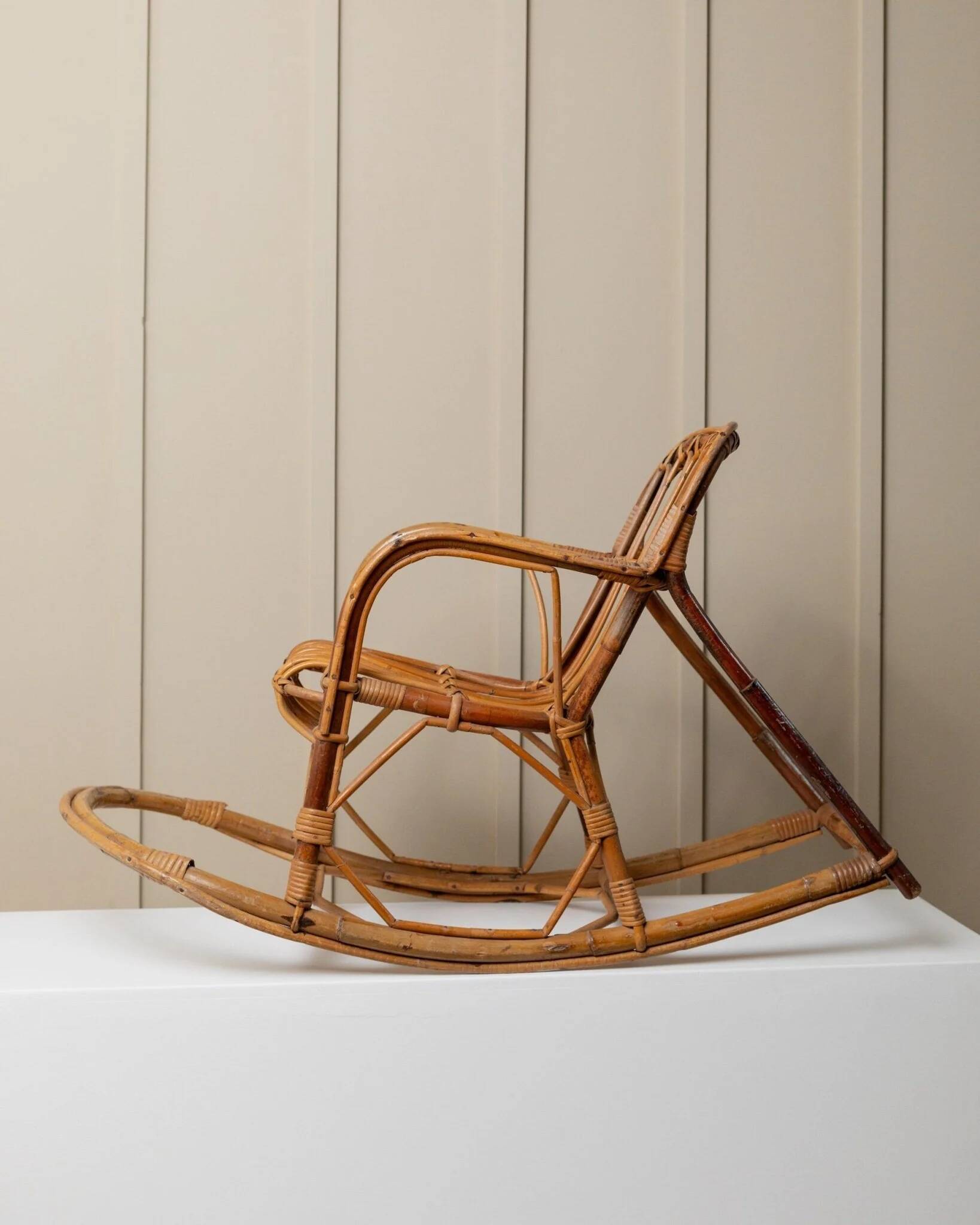 Vintage bamboo rocking chair for children - warm honey-brown cane with rattan frame, Boho mid-century Italian design (1970s)