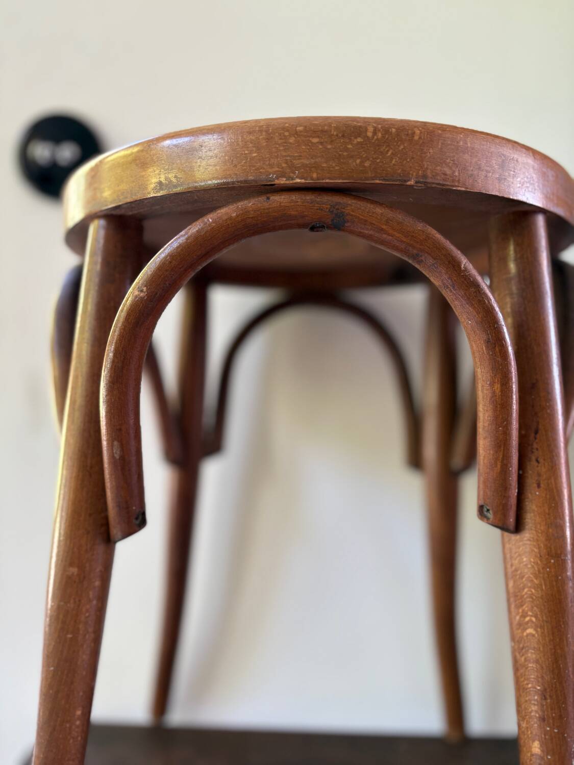 Thonet low stool in vintage wood