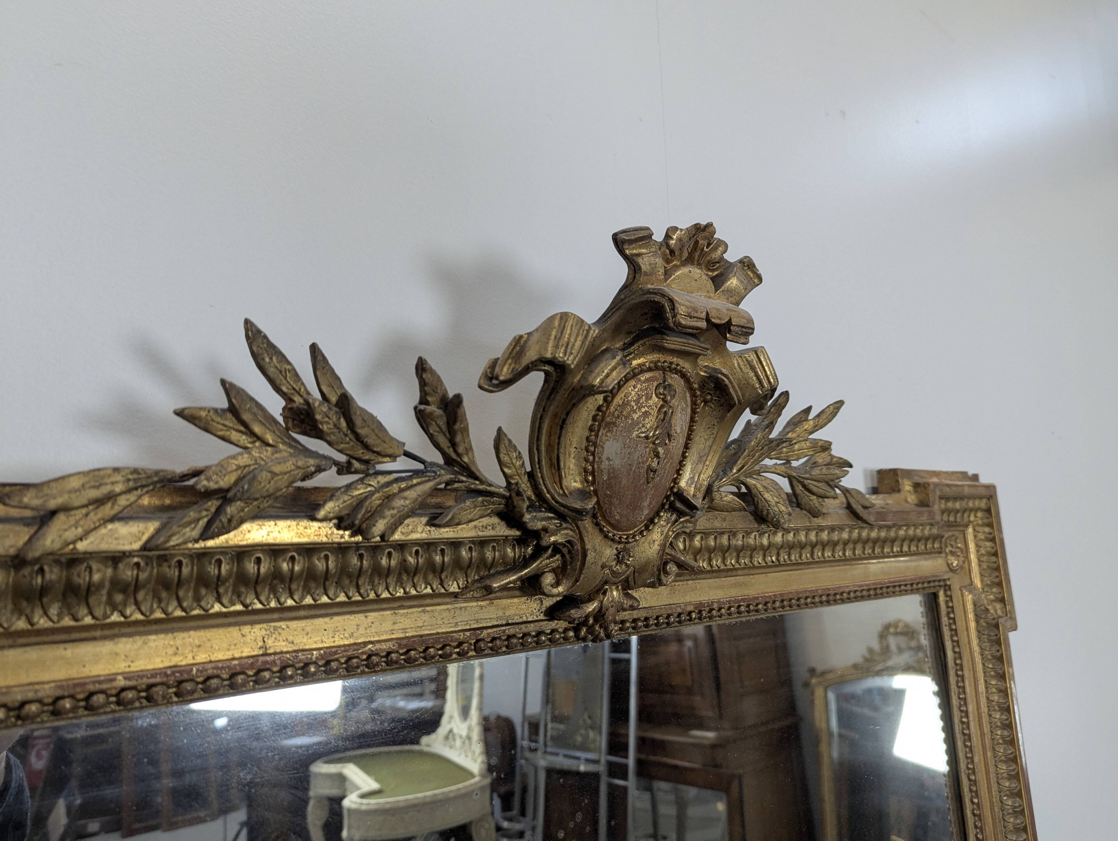 Large stucco and gilded wood mirror from the Napoléon III period.