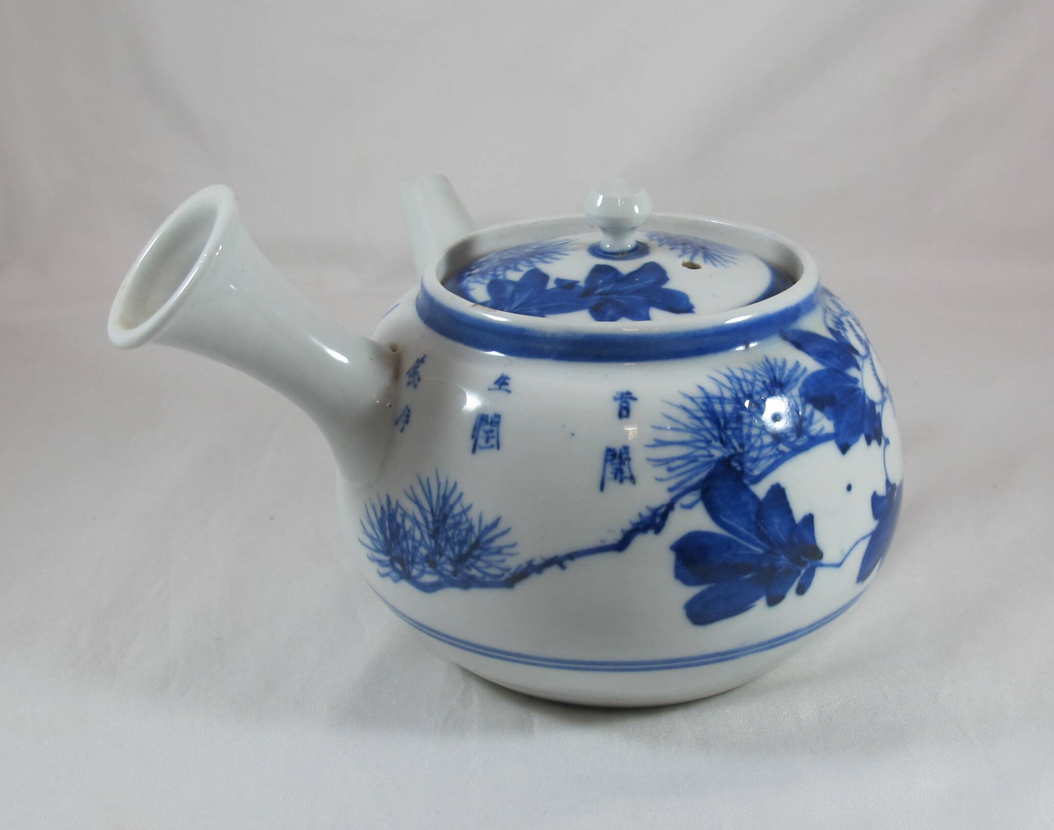 small Chinese or Japanese blue and white porcelain teapot early 20th century