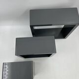 3 nesting shelves in grey lacquer.