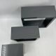 3 nesting shelves in grey lacquer.
