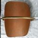 Copper log holder and laison
