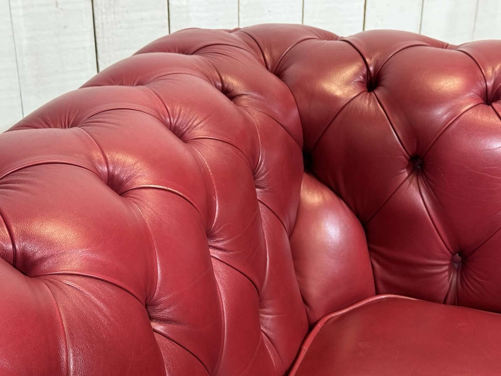 Chesterfield 2-seater leather sofa, modern production from the 2000s.