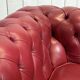 Chesterfield 2-seater leather sofa, modern production from the 2000s.