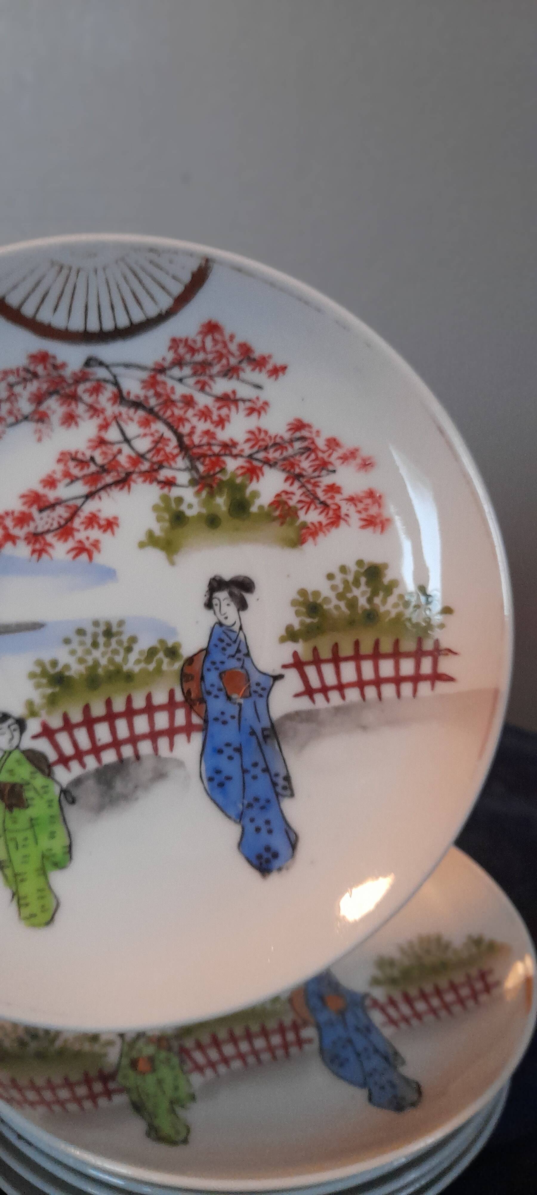 7 sub-cups / small plates porcelain extrafine geisha décor and Japanese landscape, early twentieth century