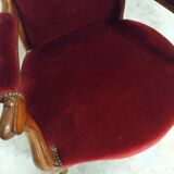 Walnut and velvet armchair