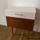 Wooden bedside table and nude