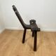 Pair of low tripod chairs in solid wood, mid-20th century.