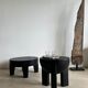 Black mango wood tripod side table with a semi-spherical top, height: 45 cm, diameter: 44 cm.