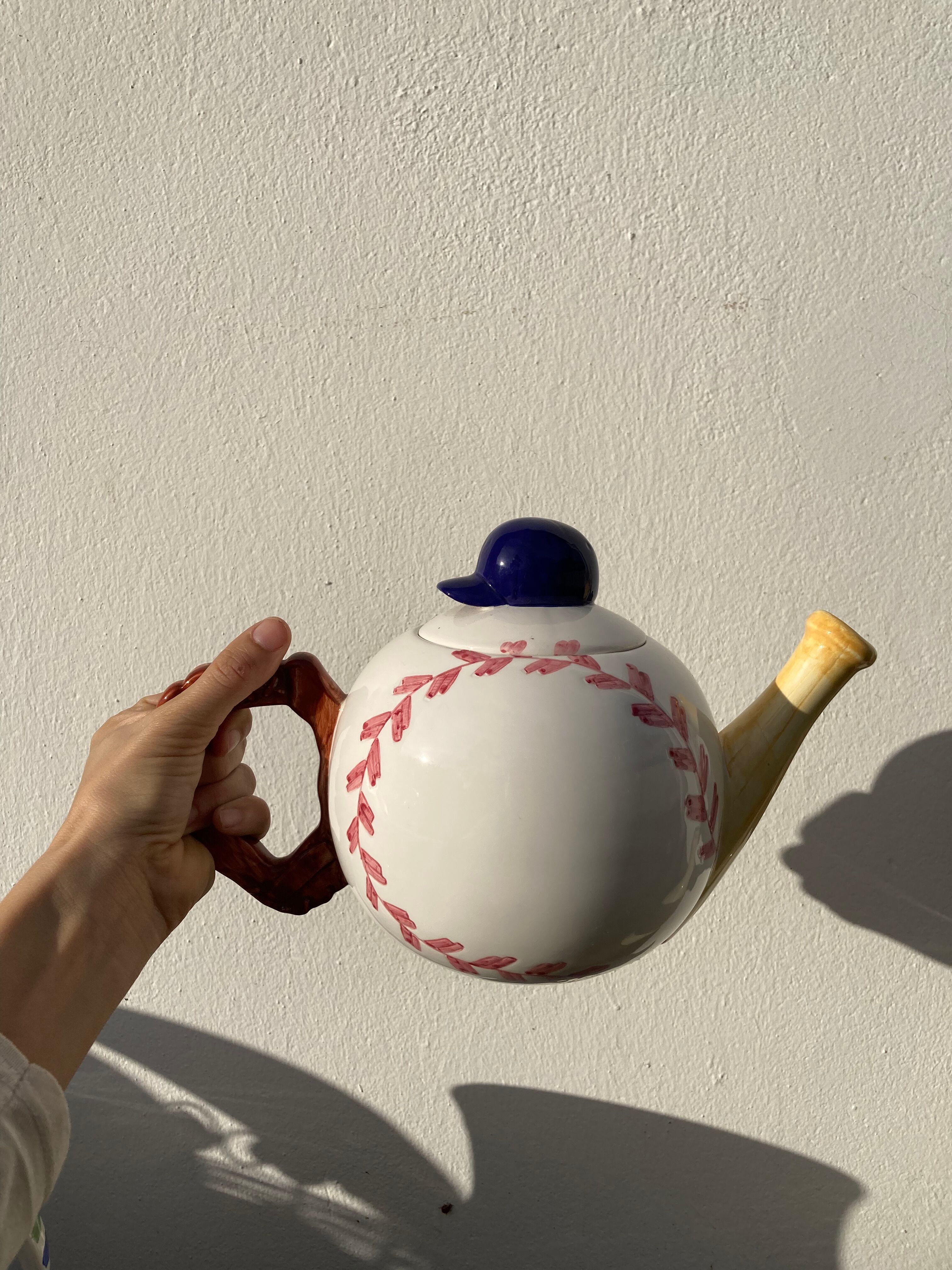 Teapot in white ceramic baseball