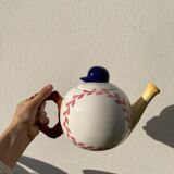 Teapot in white ceramic baseball