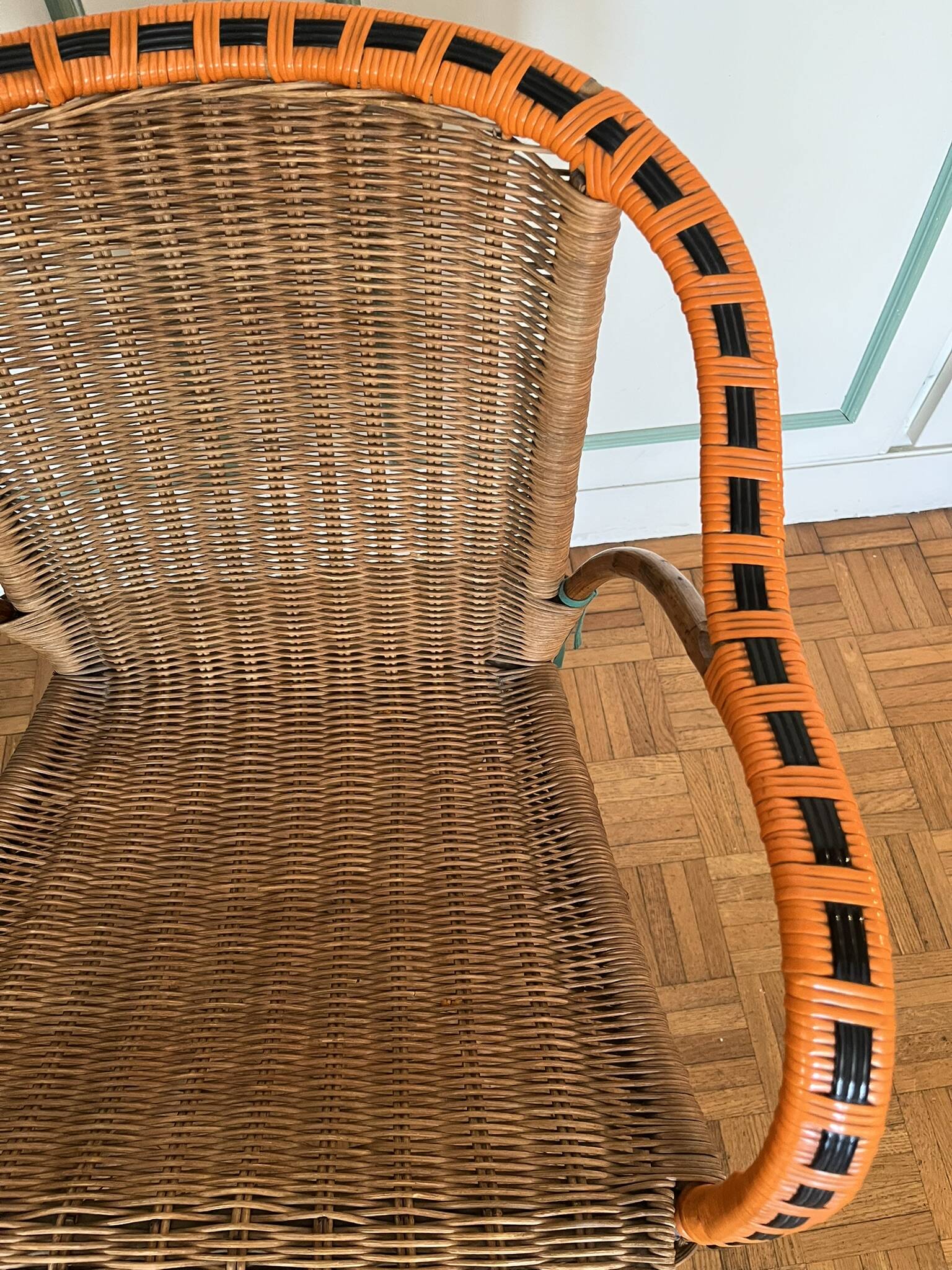 Vintage rattan armchair from the 60s-70s – Orange and black graphic trim - Sty