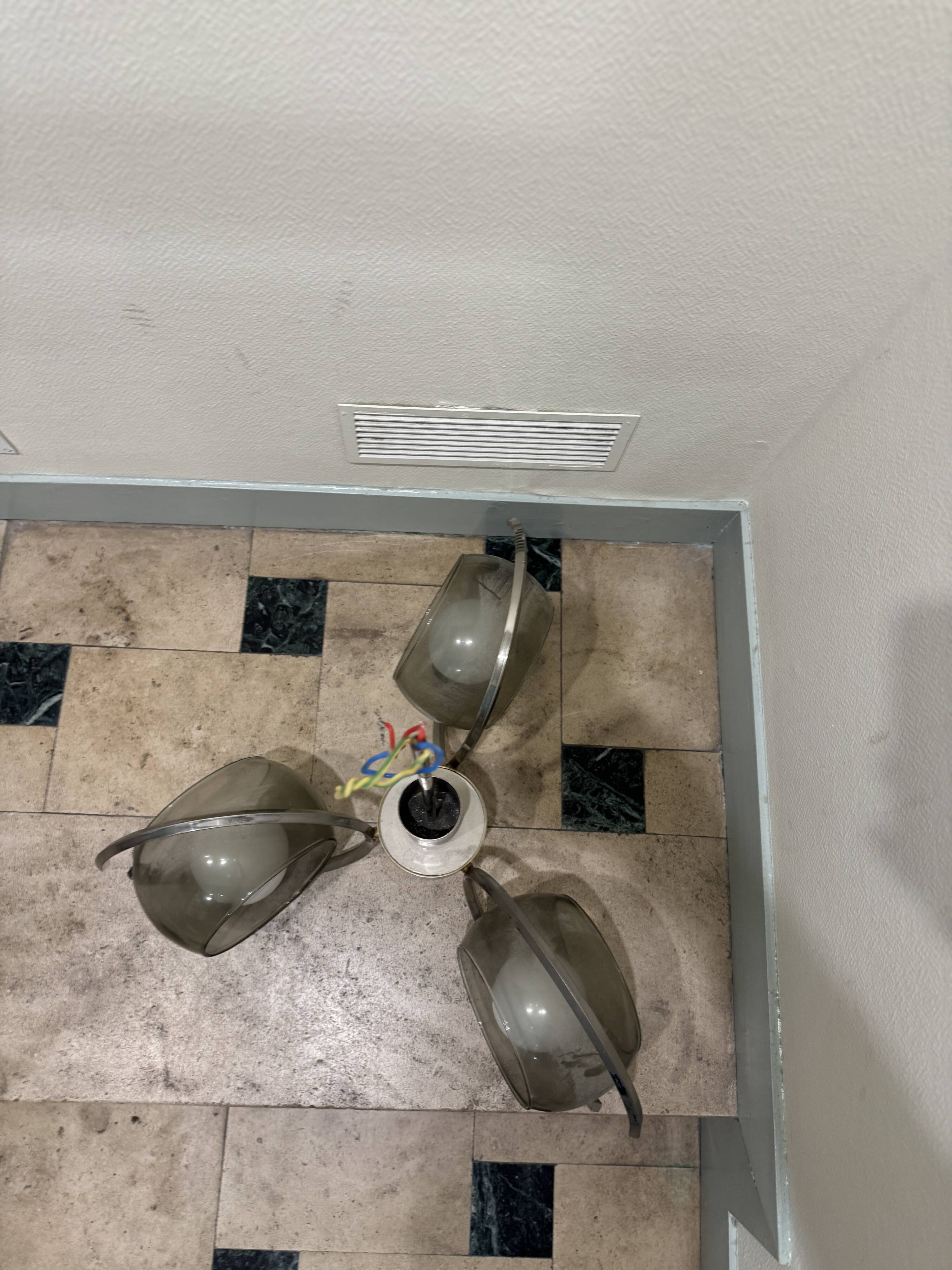 Vintage suspension with 3 smoked glass globes and chrome metal from the 1970s.