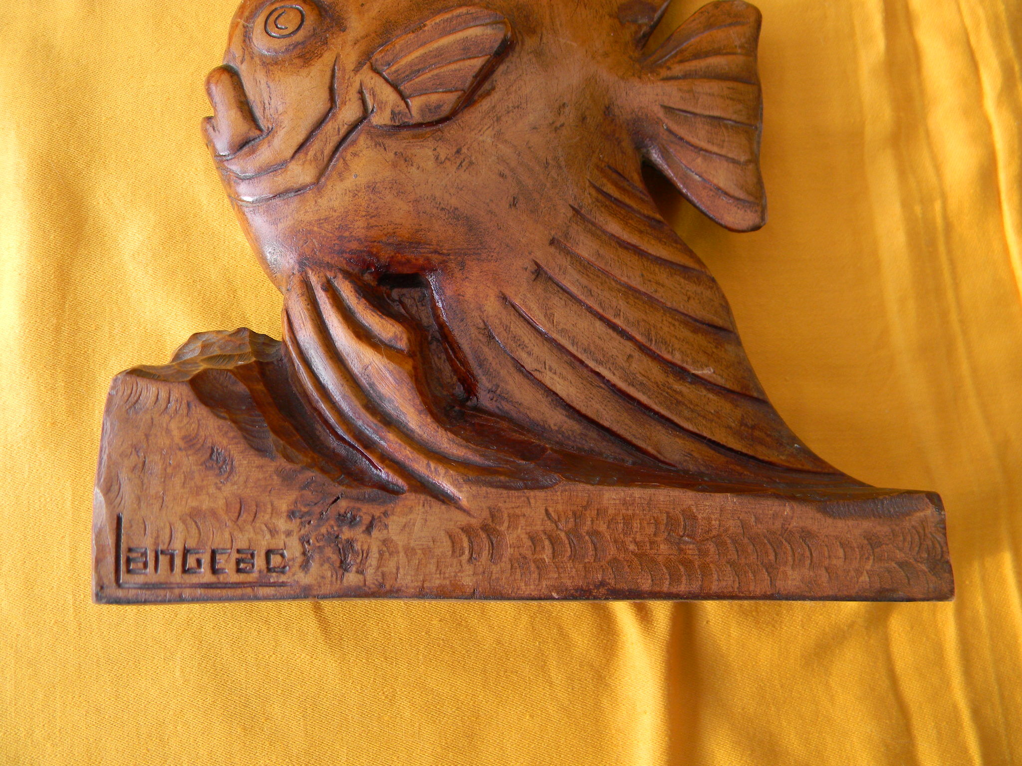 Wooden sculpture representing a langeac fish
