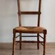 Chaise basse « nourrice » paillée vintage