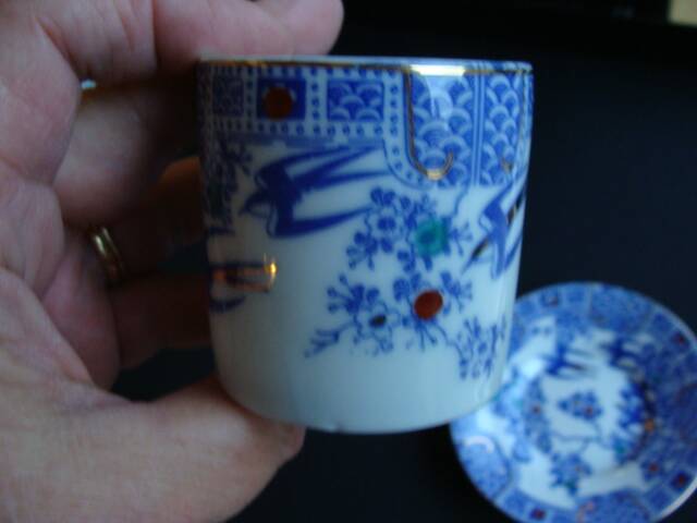 Asian Swallow Cup and Saucer