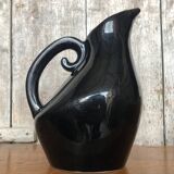 Ancien pichet en porcelaine émaillée noir ,reflets bleus, intérieur jaune, 1950