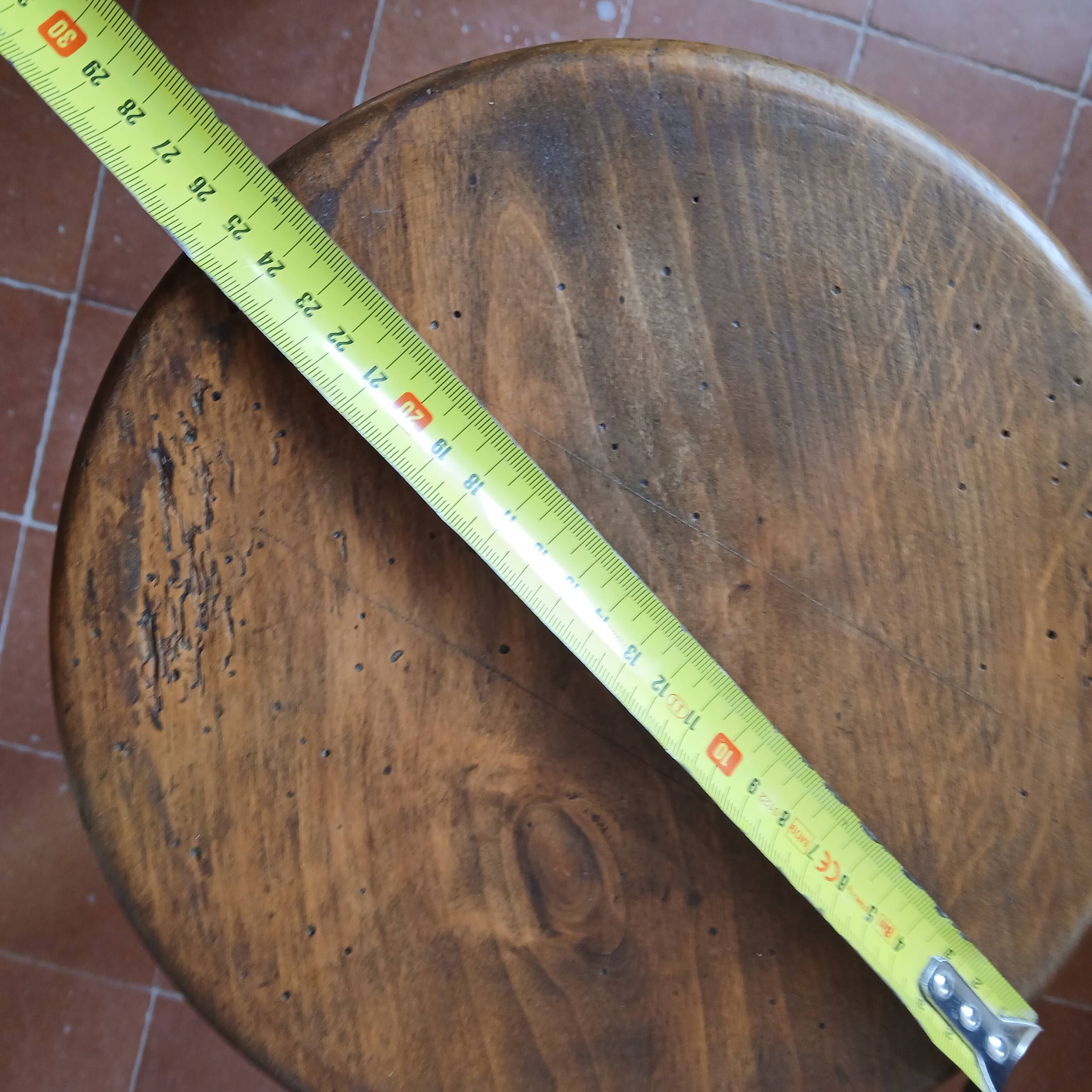 Turned wooden tripod stool