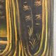 Old african canvas under lively woods in tropical and lush forest signed to identify
