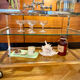 Title: Hollywood Regency chrome & glass side table – 1970s
