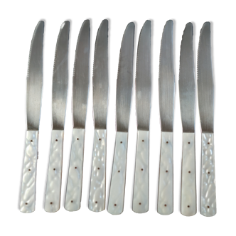 Nine stainless steel knives with mother-of-pearl handle