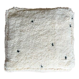 Moroccan Berber pouf with bohemian black polka dots