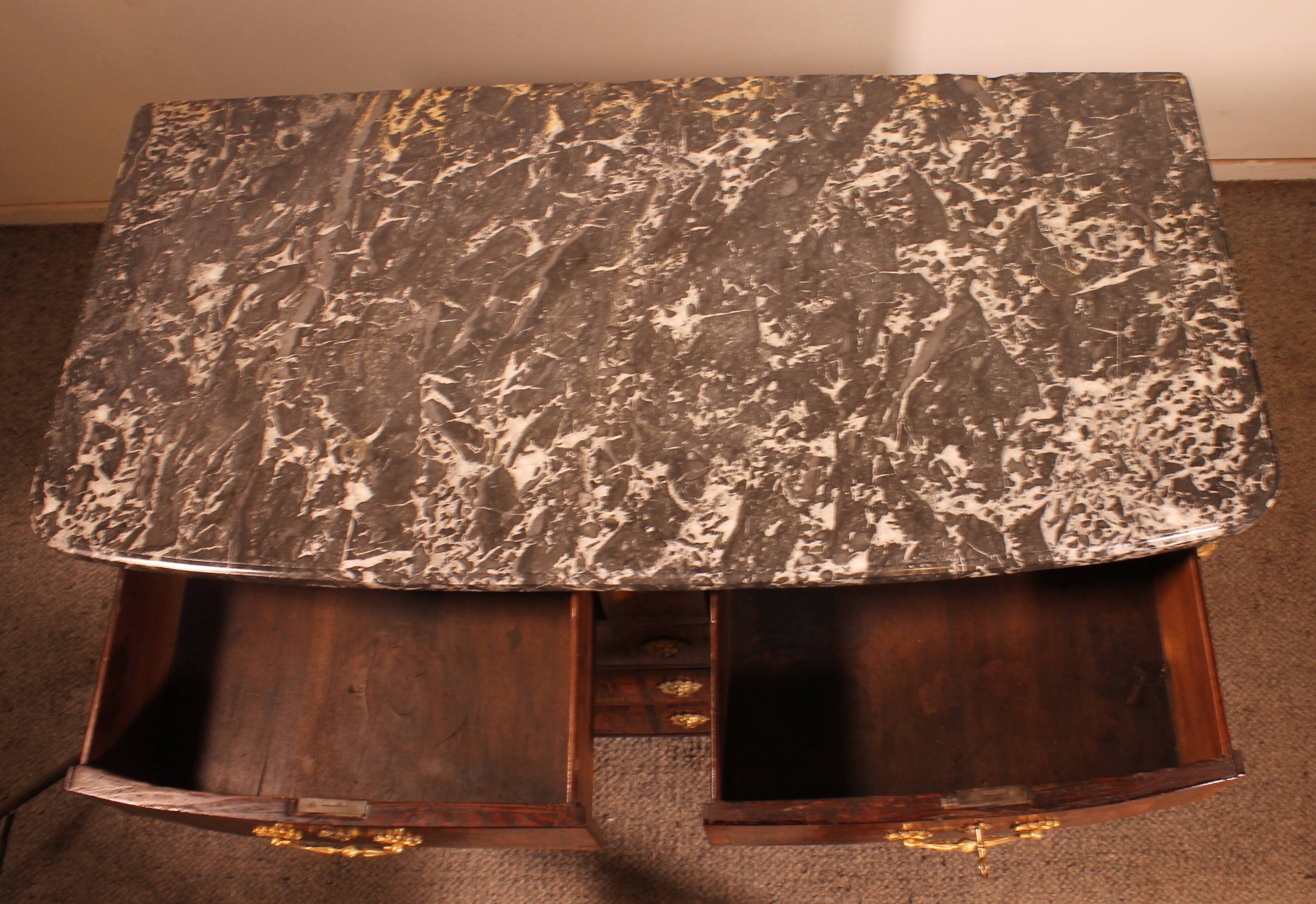 Dauphiné commode from the Louis XIV period in olive wood marquetry.